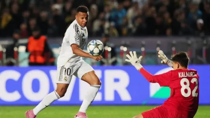 Ligue des champions: un triplé de Kylian Mbappé porte le Real aux confins de l’Europe